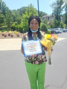 A picture of Vera, our caregiver of the month for June 2021.