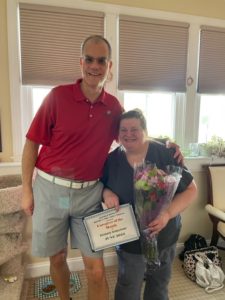 Kimberly, our Caregiver of the Month for June 2022, with Brian Perruccio.