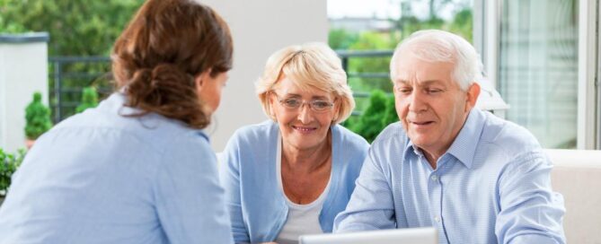 An elderly couple discusses caregiving options with their daughter.