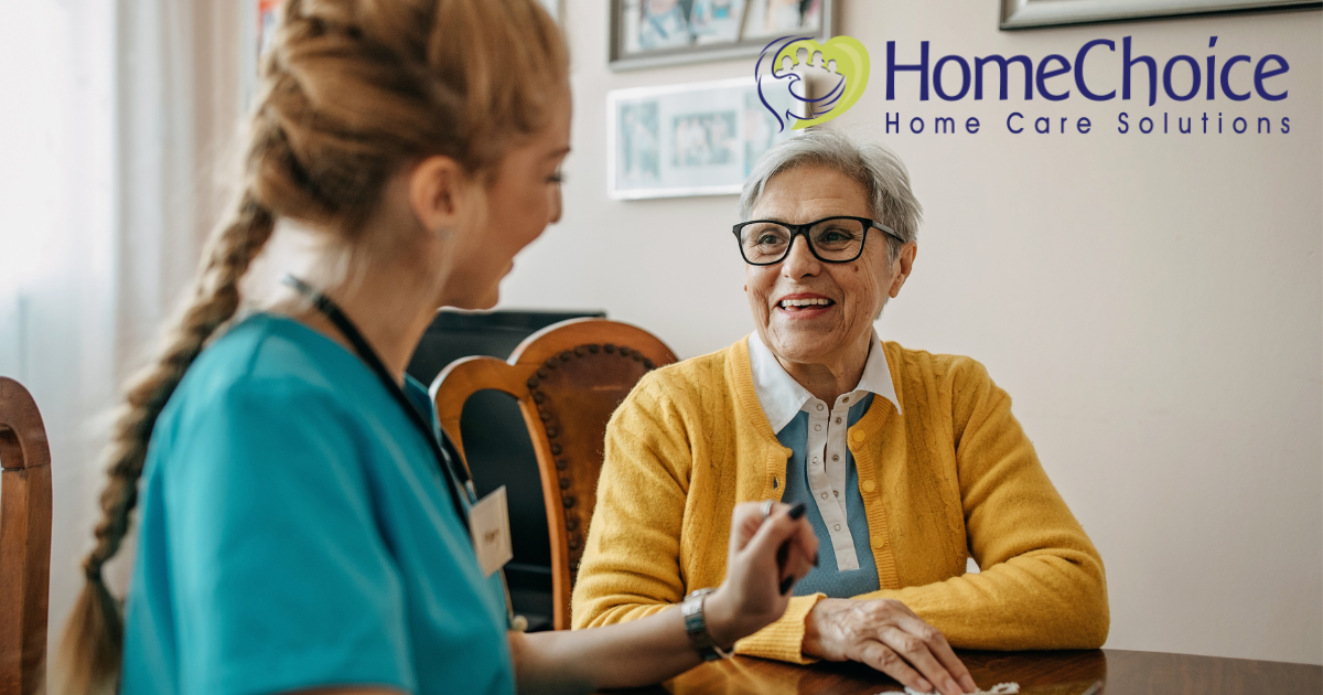A senior woman enjoys the benefits of private duty care as her caregiver checks in on her.