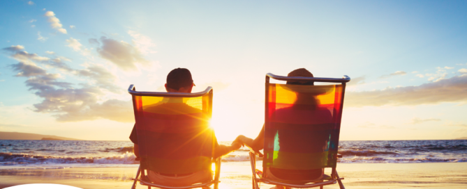 Caregiver travel hacks can help couples like this one on the beach enjoy their vacation.