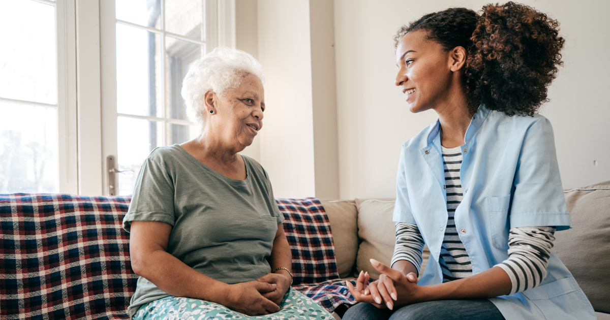 A happy caregiver takes care of a happy client, representing what companionship care can do for those in Johnston County.