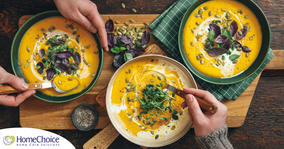 Pumpkin soup like the one in these bowls can be a great choice for a winter food for older adults.