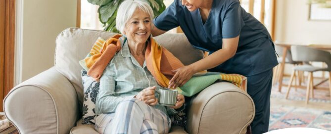 An aide provides home health care support for chronic conditions