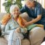 An aide provides home health care support for chronic conditions