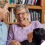 Through dementia care at home, a caregiver provides support to a senior.