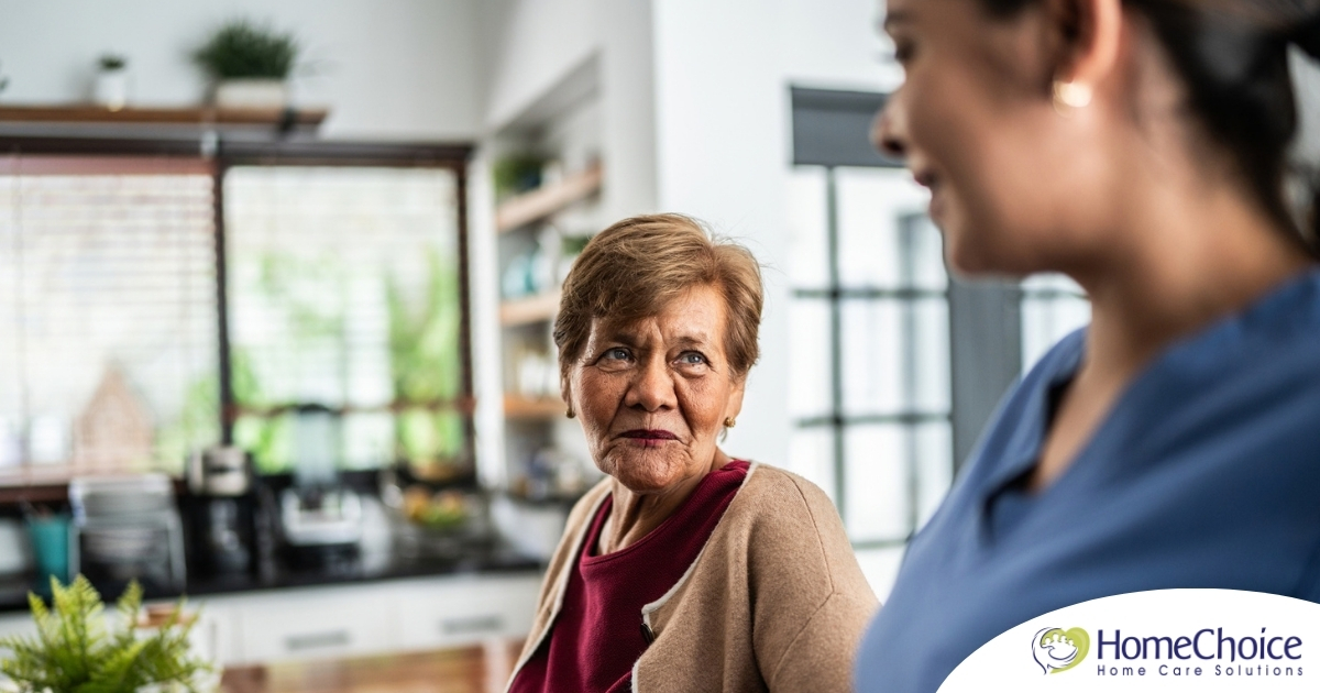 Caregiver provides attentive senior care as part of diabetes awareness