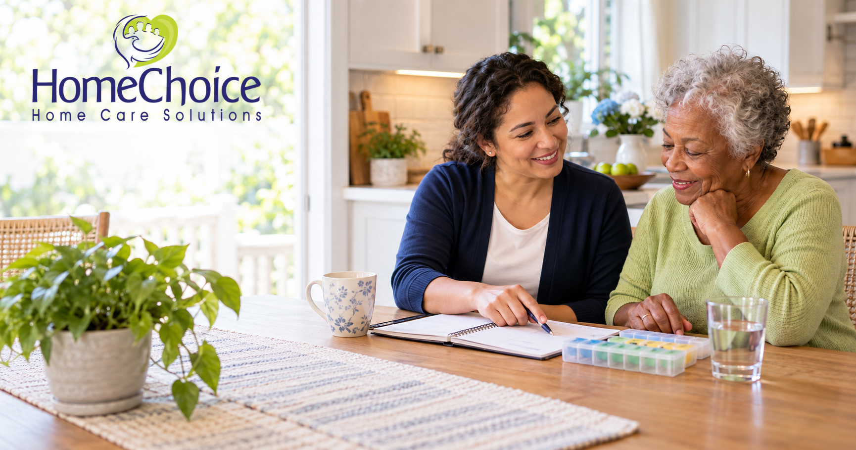 HomeChoice caregiver reviewing a daily medication routine with an older woman beside a pill organizer and glass of water at home.
